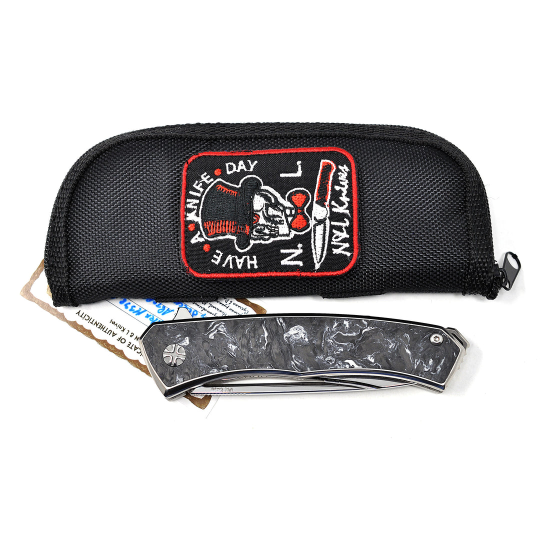Zipper pouch and Certificate of Authenticity are included with NL Knives Aurum Ultimate Custom knife