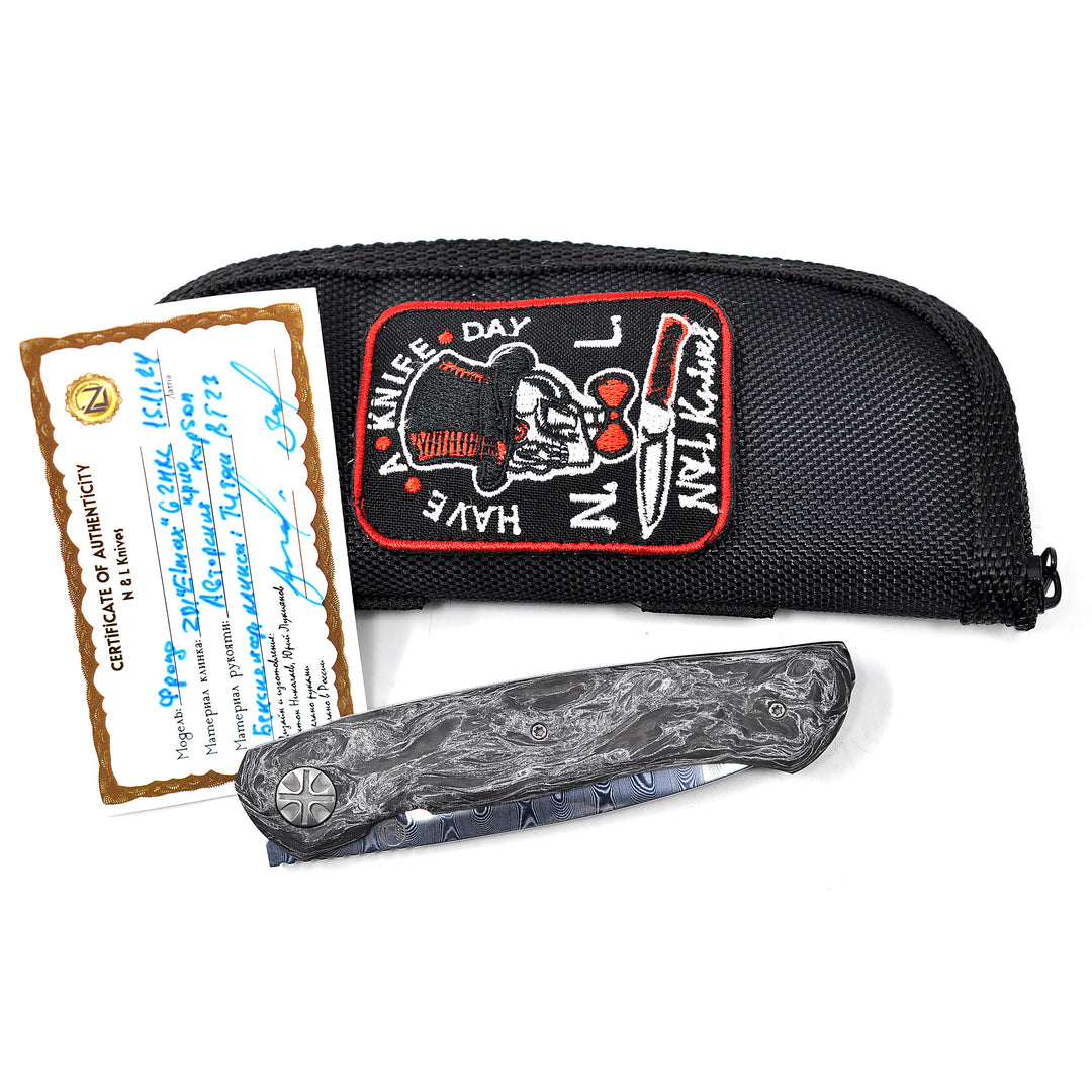 Zipper pouch and Certificate of Authenticity on Frodo 2.0 front flipper knife by NL Knives
