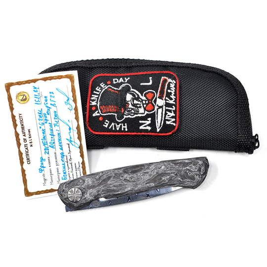 Zipper pouch and Certificate of Authenticity on Frodo 2.0 front flipper knife by NL Knives