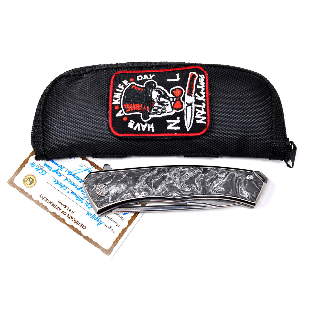 Zipper pouch and Certificate are included with every  Aurum Ultimate Custom Raindrop Edition folding knife by NL Knives.