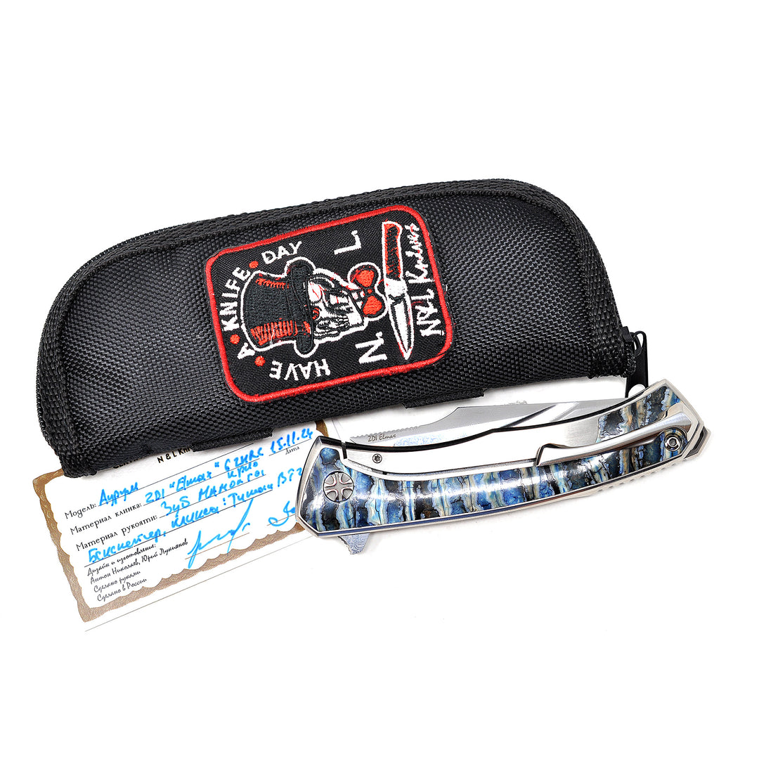 Custom pouch and certificate are included with the Aurum Ultimate Custom from NL Knives