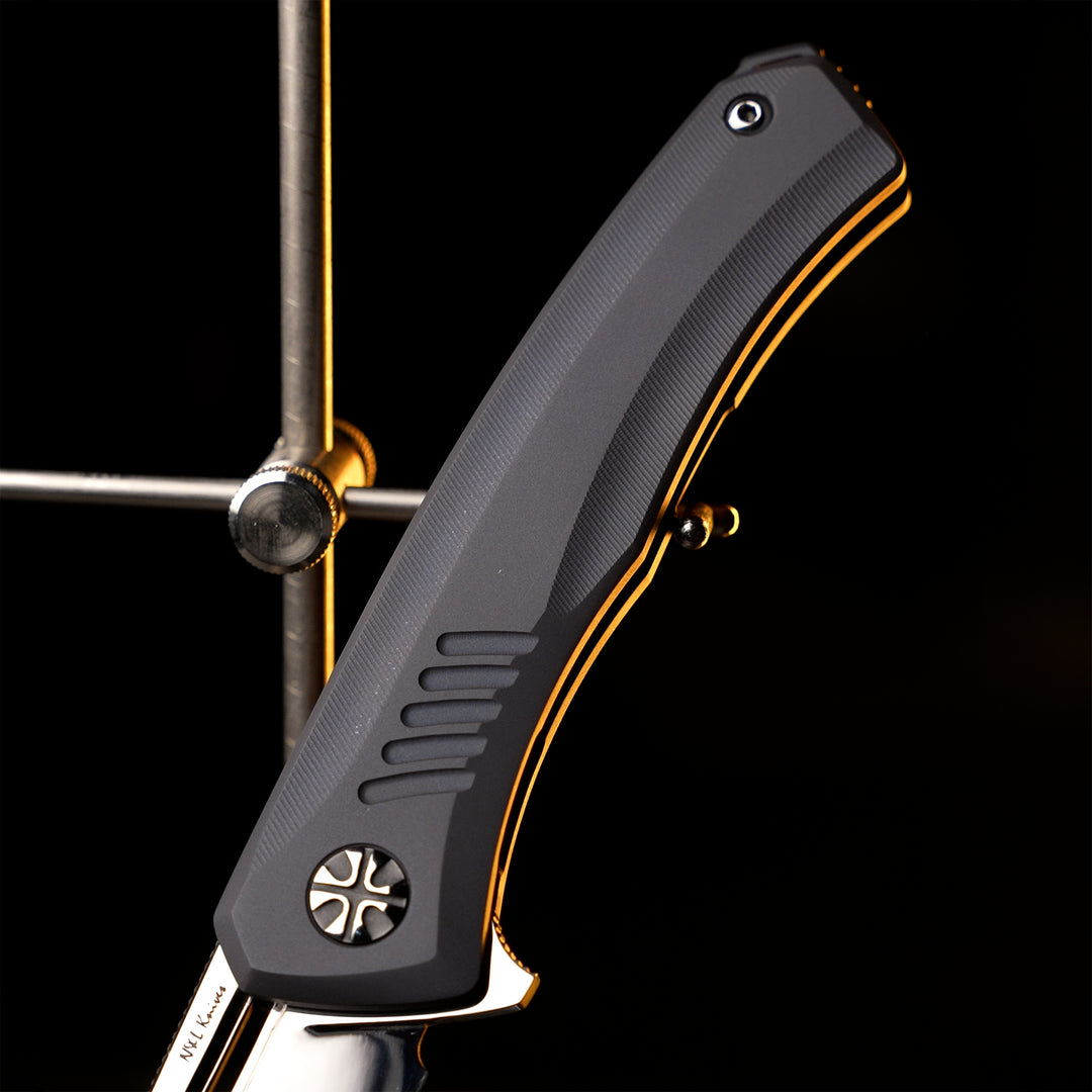Titanium handle details on Aurum knife by NL Knives
