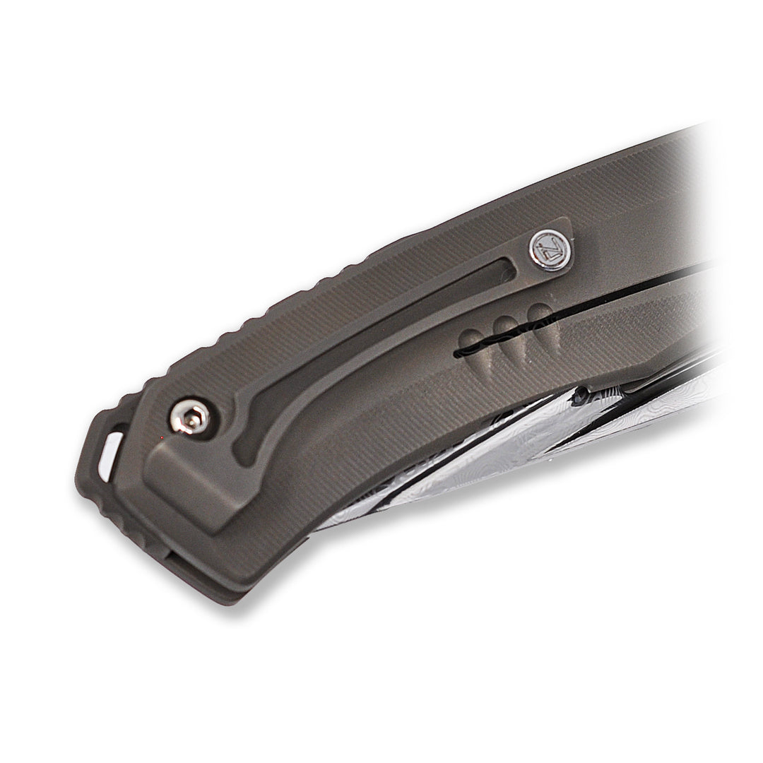 Titanium pocket clip details on Aurum Nudist Bronze knife from NL Knives