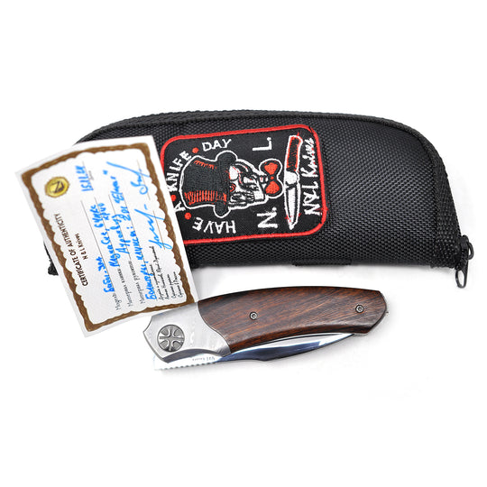 Zipper pouch and certificate are included with Baba Yaga MagnaCut Edition folding knife from NL Knives