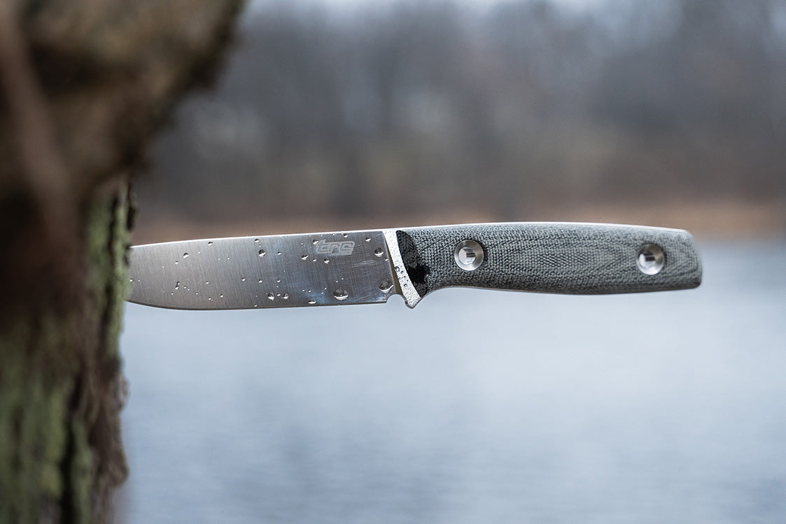 TRC This Is Freedom knife in the tree