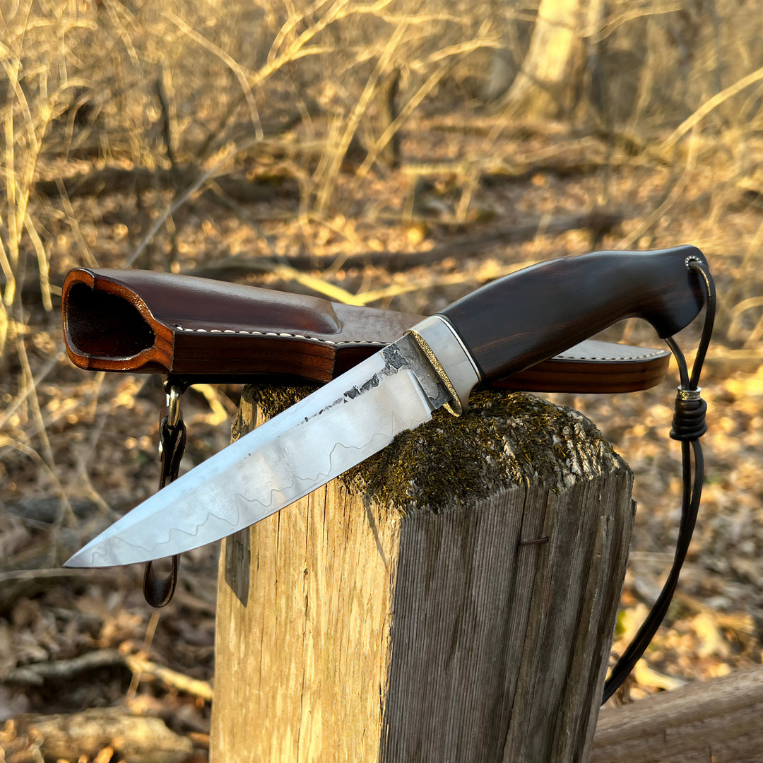 Andrii Titov Model 3 knife with the sheath outdoor