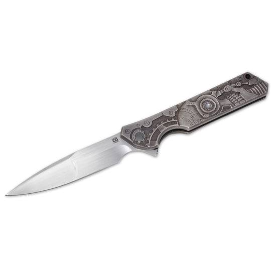 Olamic Rainmaker “Robot Skull” – Hand-Carved Titanium Art Knife (M390 Blade, Compound Grind by Mike Irie)