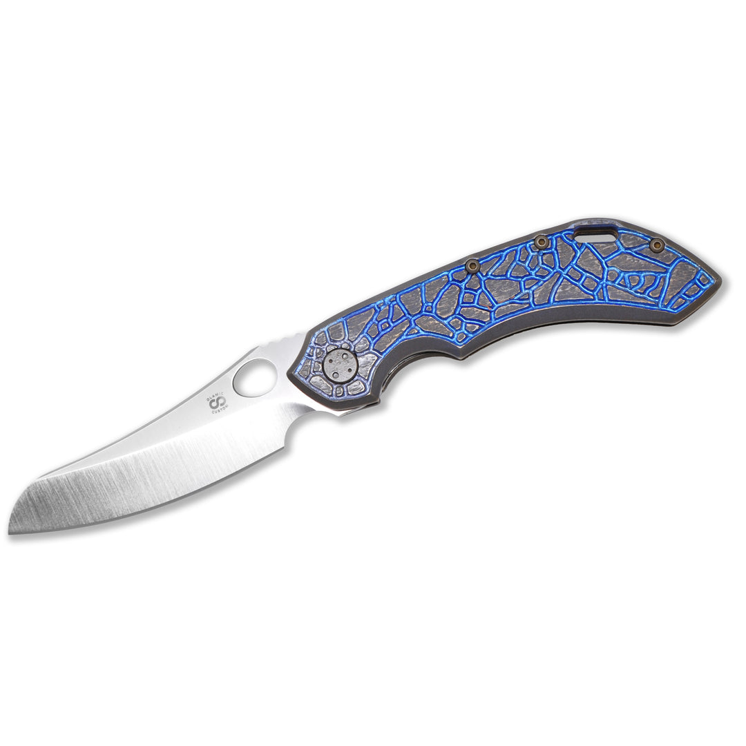 Olamic Wayfarer 247 flipper-delete with S90V Mouflon blade and blue Isles titanium handle – open view.