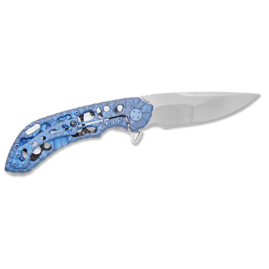 Blue anodized titanium handle with Volcanic carving and Funky Holes on Olamic 247.