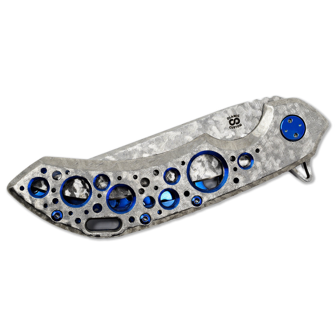 Frosty finish titanium handle with Acid Rain holes and blue accents on Olamic Wayfarer 247.
