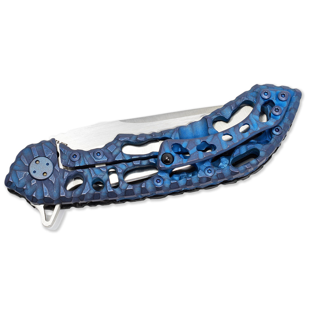 Volcanic carving and Funky Holes texture on titanium handle of Olamic Wayfarer 247