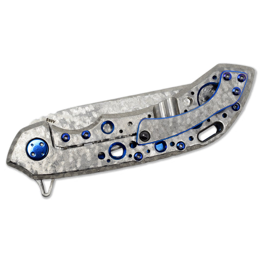 Closed Olamic Wayfarer 247 showing Frosty handle texture and blue anodized hardware.