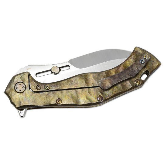 Neontropic titanium pocket clip with Rocks pattern on Olamic Soloist – custom hardware close-up