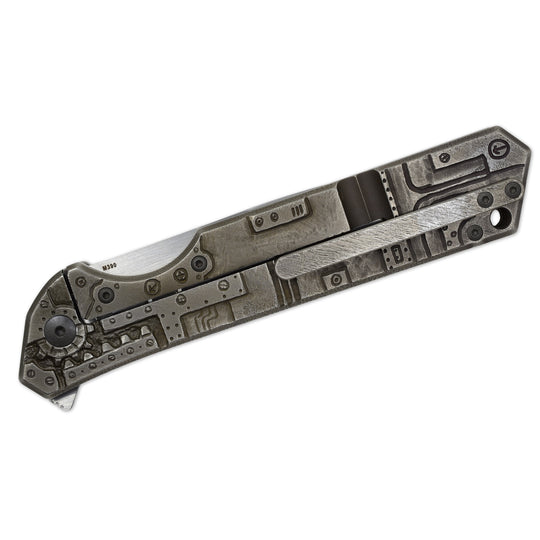 Olamic Rainmaker “Robot Skull” – Hand-Carved Titanium Art Knife (M390 Blade, Compound Grind by Mike Irie)