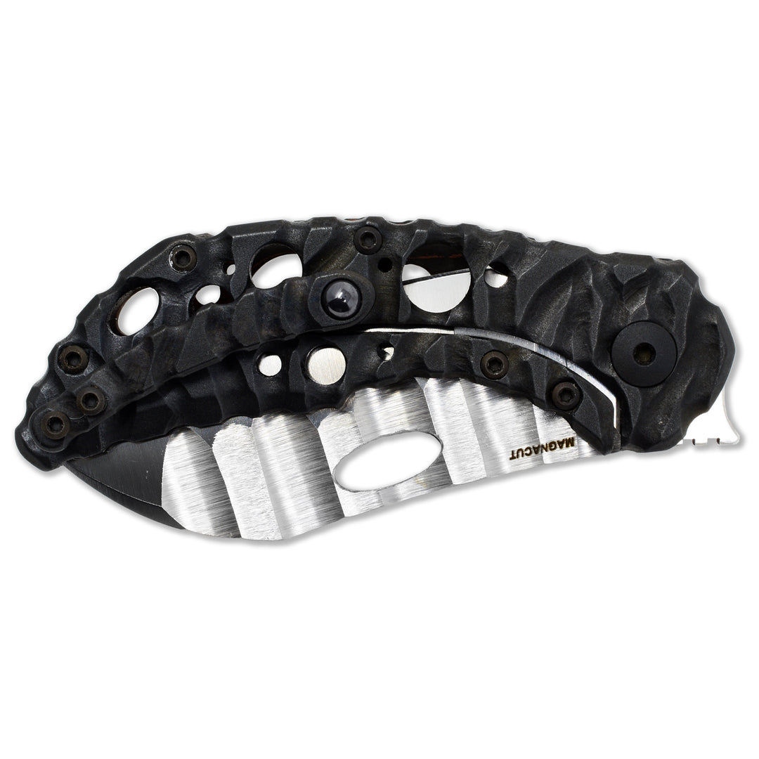Aphotic Black titanium handle with Molten pattern and Acid Rain holes on Olamic Busker.