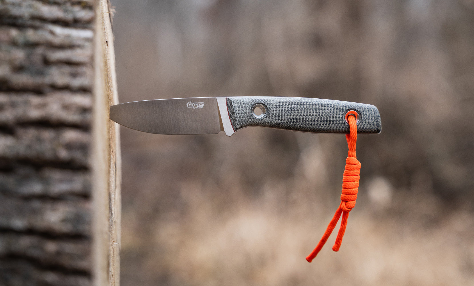 TRC Knife Classic Freedom with Micarta handle and orange cord. 