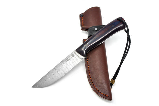 Knife with the leather sheath